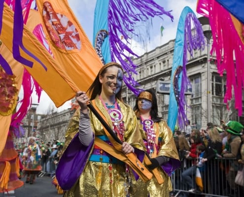 Colourful perfomers pass O'Connell Street in the St. Patrick's Festival parade